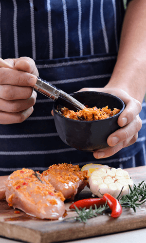 Man Marinating Chicken